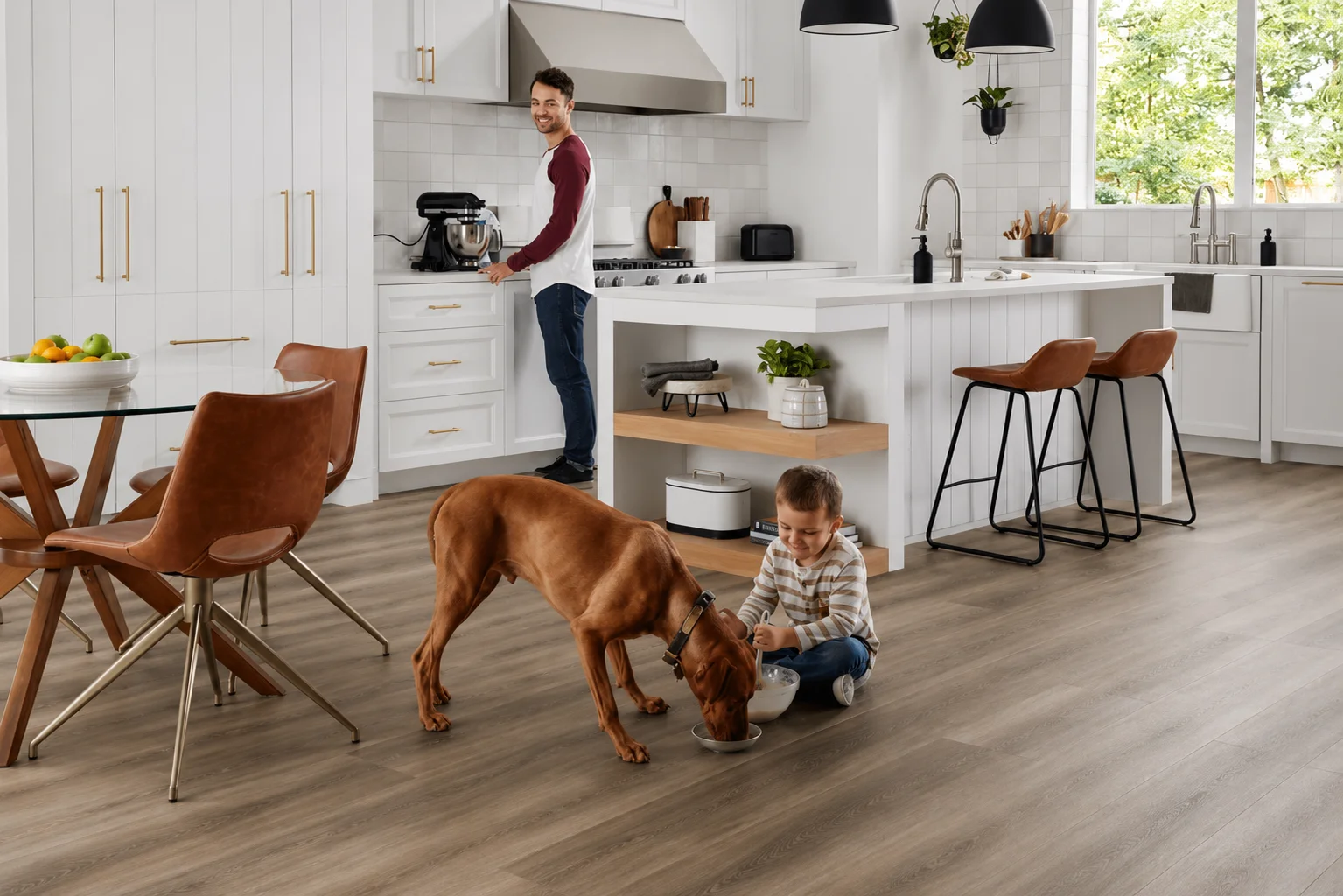 A family and their dog in a bright kitchen with warm luxury vinyl plank flooring